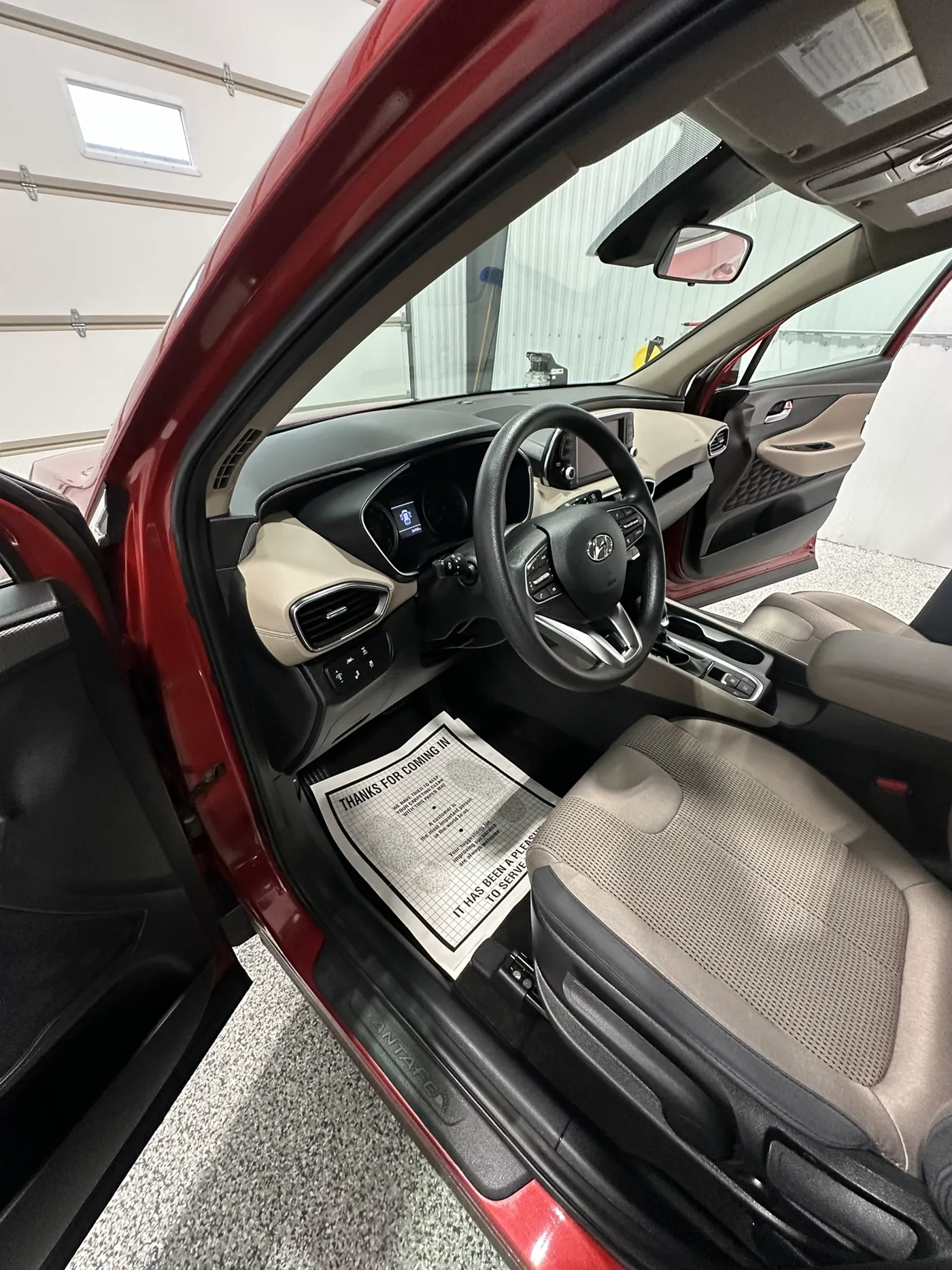 Interior auto detailing and extraction work on a vehicle in River Falls, WI