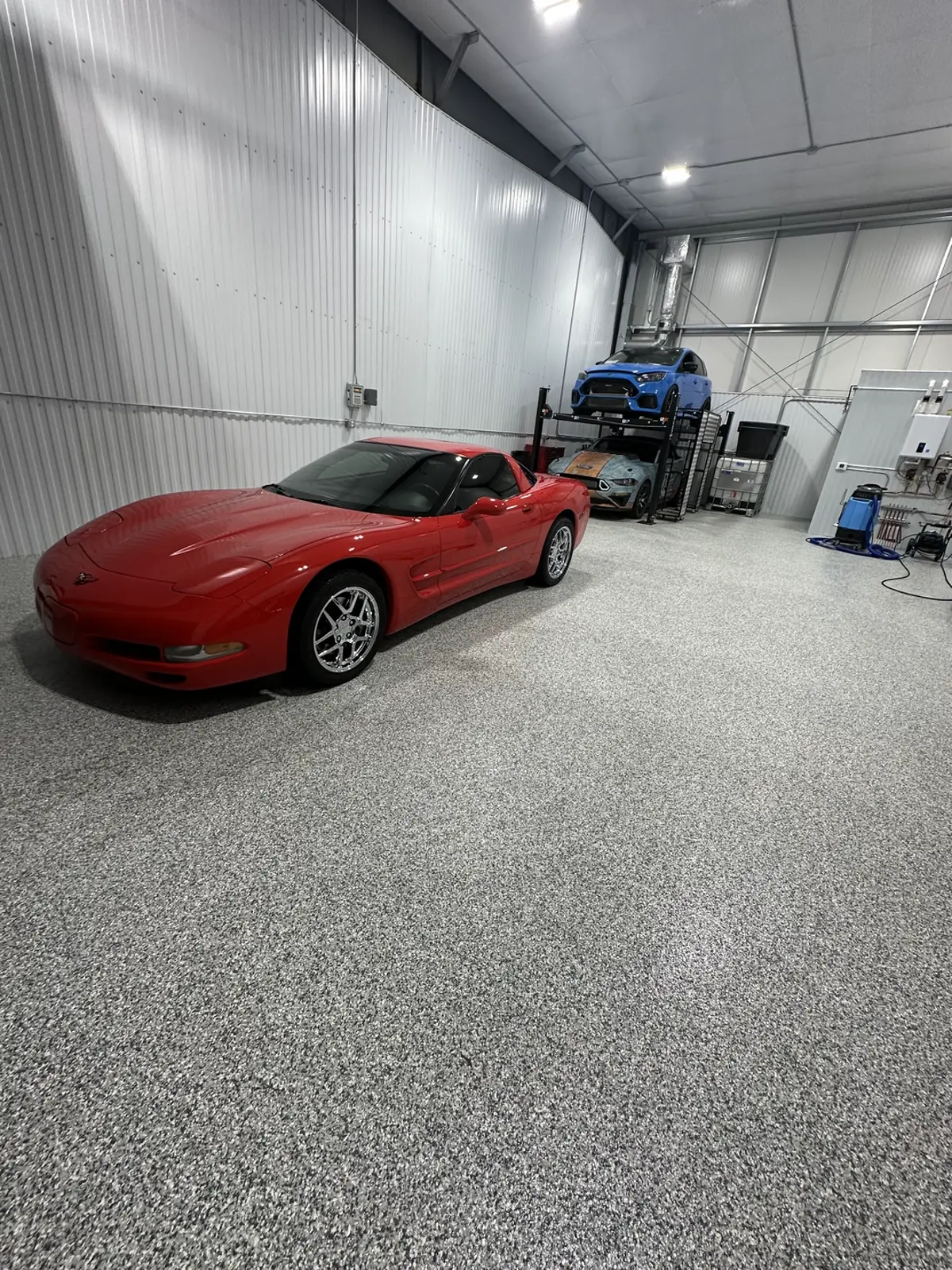 Paint correction work under shop lighting at AJR PDR and Goodfellas Detailing